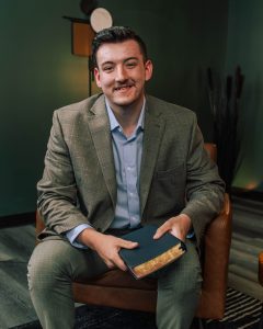 Evangelist Tommy Crissman Tommy Crissman sitting with Bible